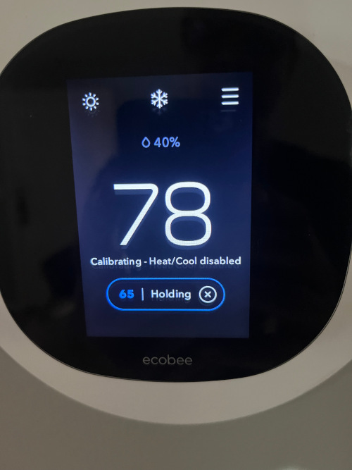 Image of a ecobee thermostat during an AC repair