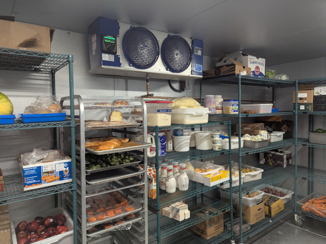 image of a walking freezer evaporator coil being maintained